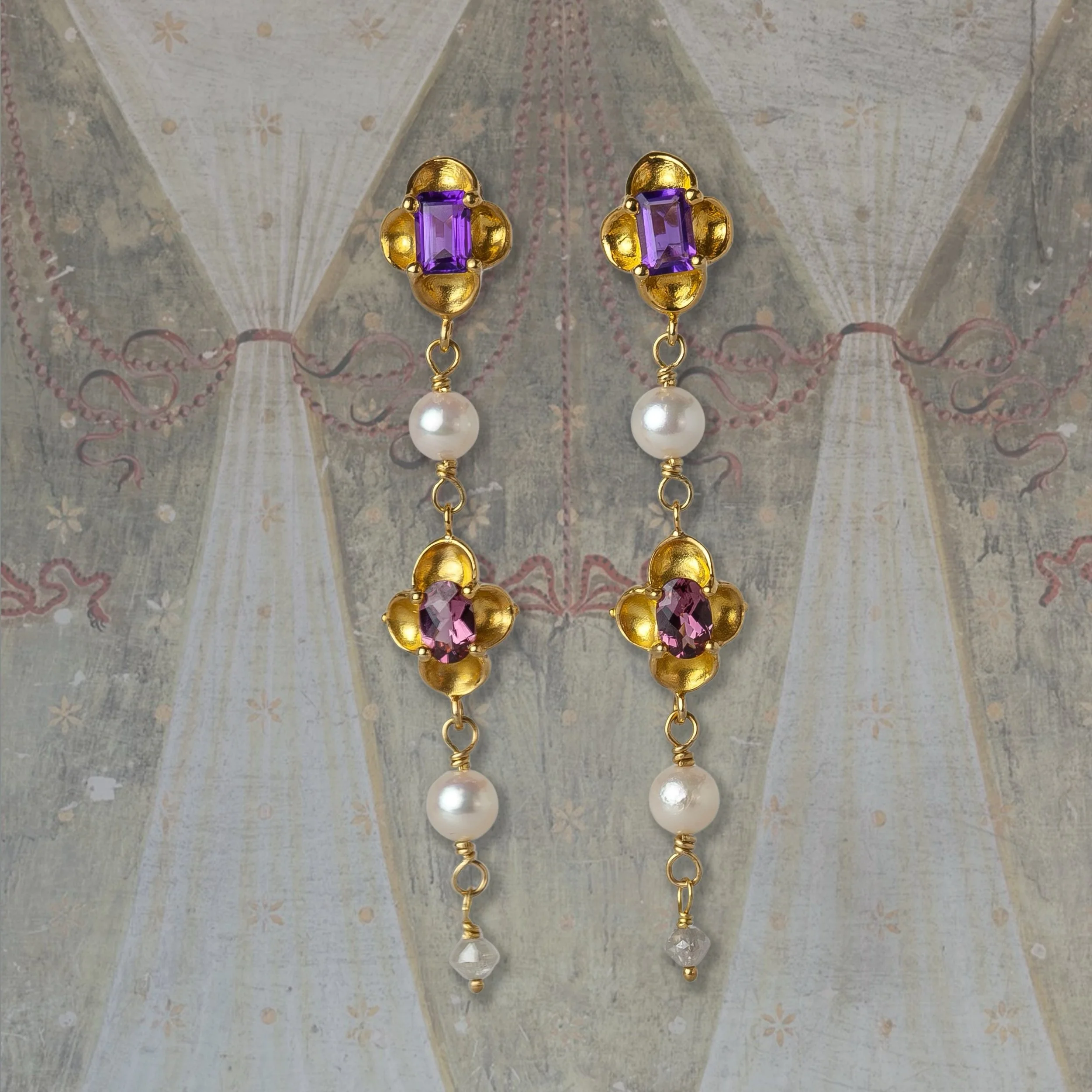 Francesca Earrings

Named for Renaissance artist Piero della Francesca, these earrings are inspired by the jeweled details on the robe of St. John the Evangelist, depicted in della Francesca&rsquo;s painting in The Frick Collection. Handcrafted in 22
