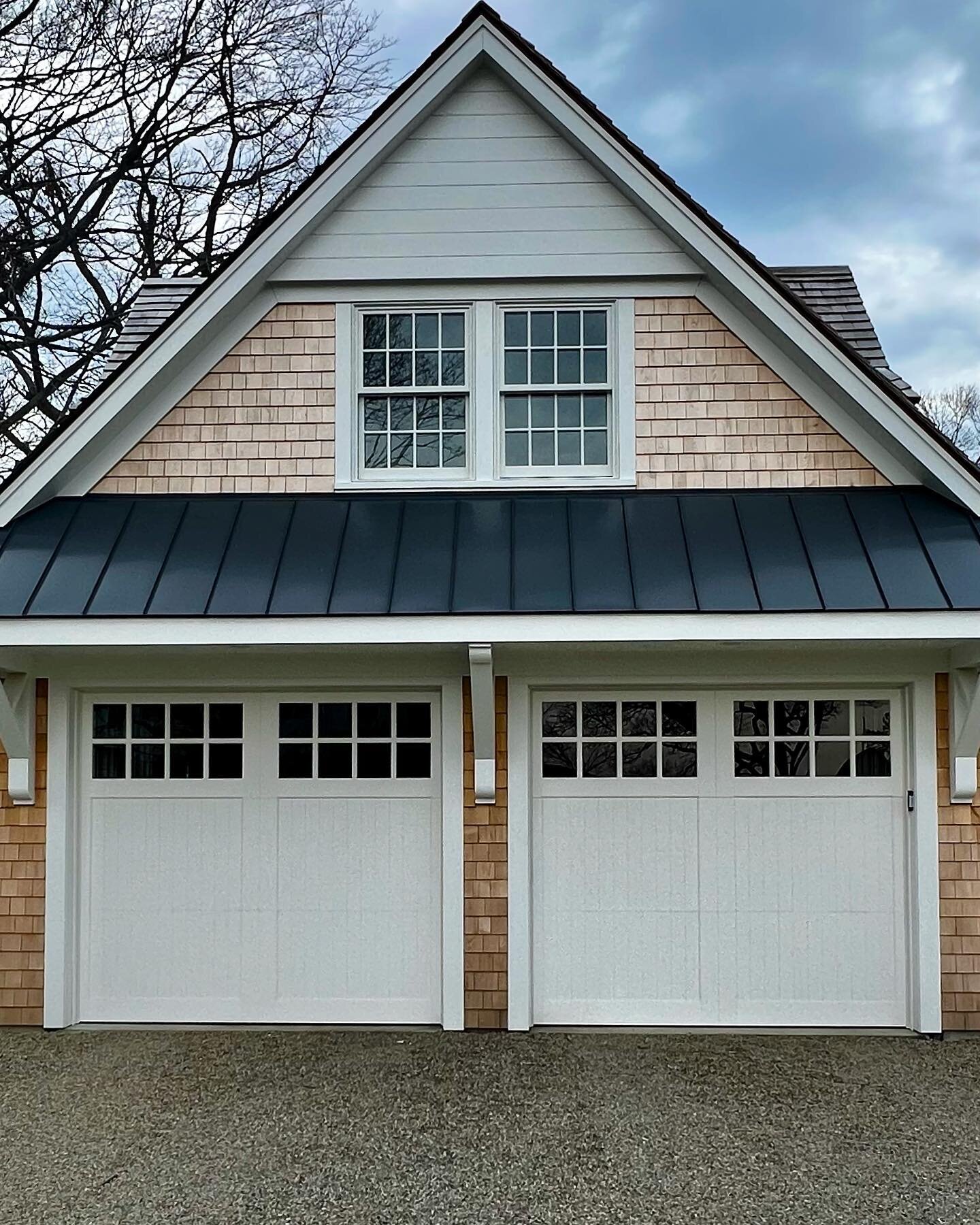 Just a simple and classic design&hellip; these doors are a stones throw away from the salt water. The doors are made of versatex to look and feel like wood- without the upkeep. They will not rot, warp or crack like wood can. ⁣
⁣
⁣
⁣
⁣
#designergarage