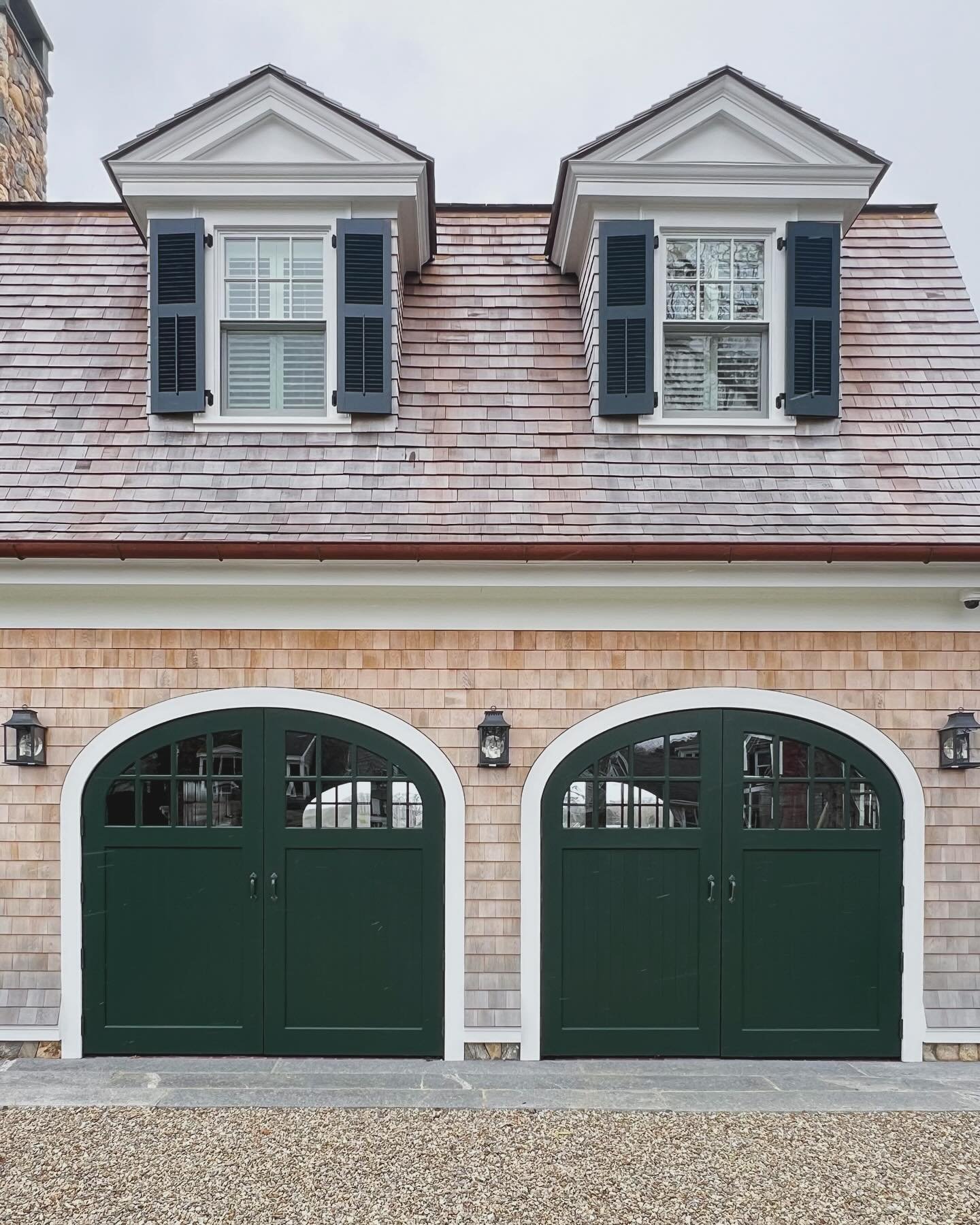 Swing out carriage doors evoke a timeless elegance with their graceful movement and classic design. Their charm lies in their traditional aesthetic, which adds character and sophistication to any style.⁣
⁣
⁣
#designergaragedoors #designerdoor #custom