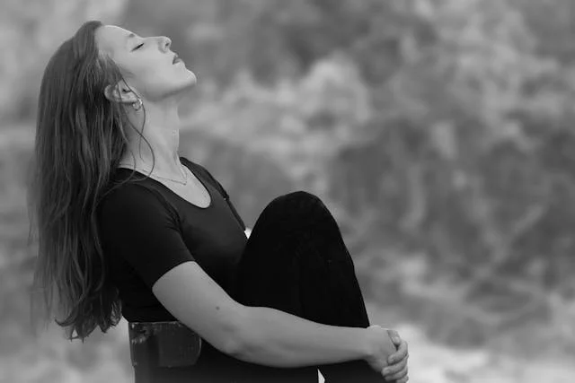 Woman practices mindful breathing