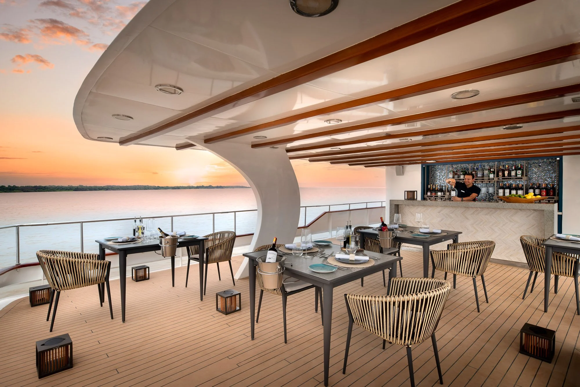 South-America-Ecuador-Galapagos-Galapagos-Explorer-outdoor-dining-area-and-bar-deck-3-crew.jpg