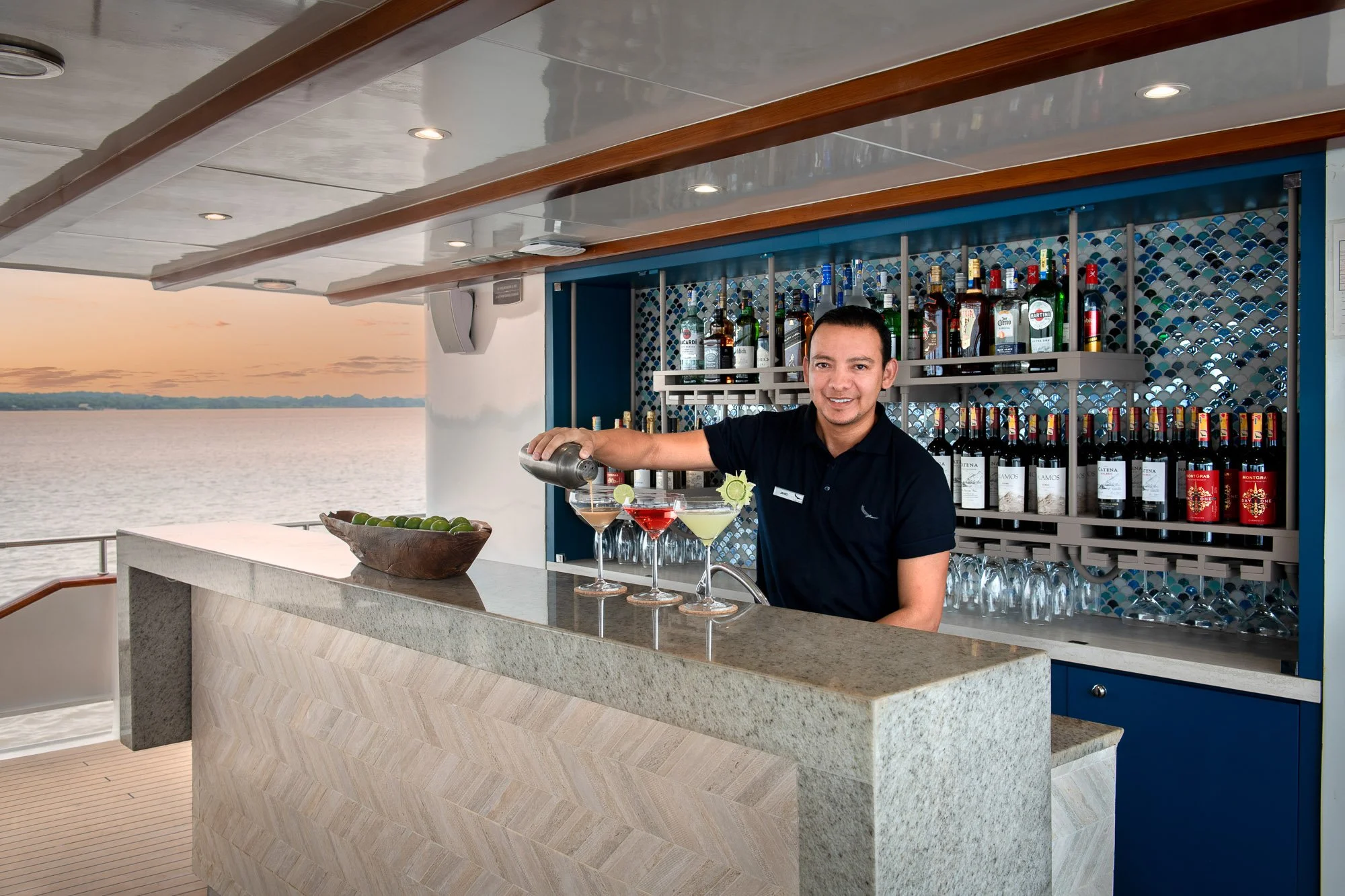 South-America-Ecuador-Galapagos-Galapagos-Explorer-bar-deck-3-crew-barman-1.jpg