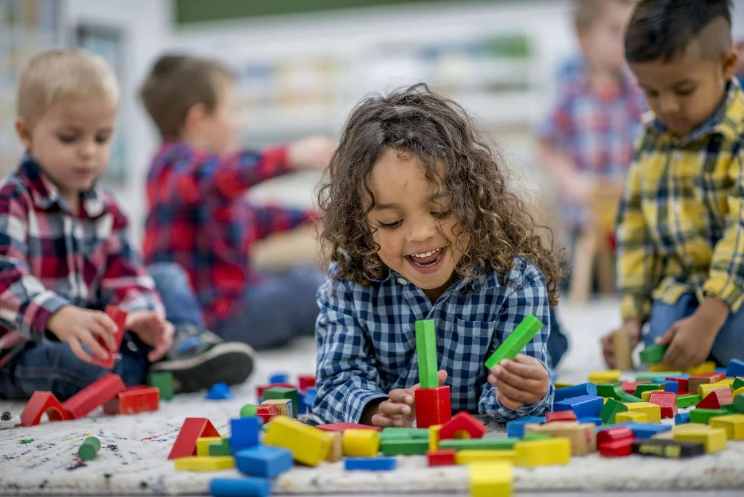 Children Playing with Colorful Blocks.jpg