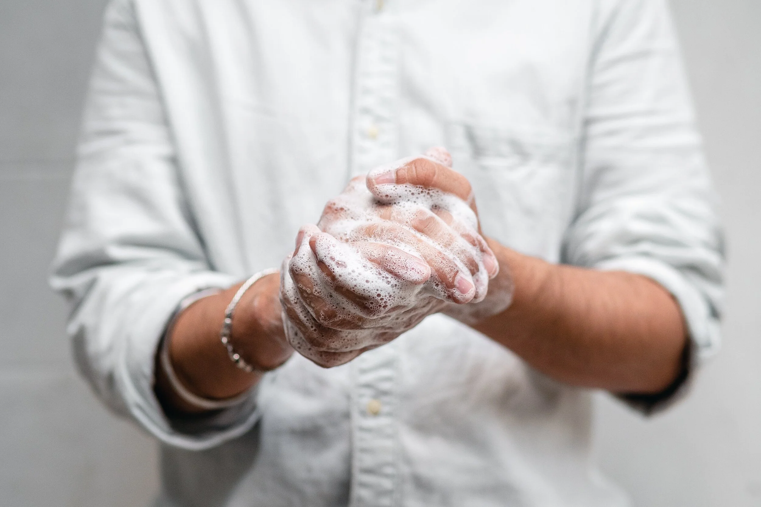 person-washing-hands-4308205.jpg