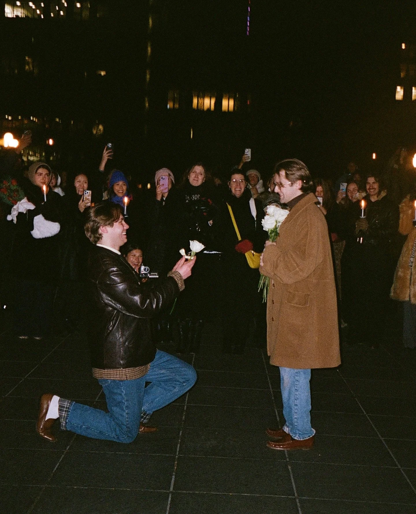 I thought I was meeting Fletcher and his family at the Washington Square Park Christmas tree for a family photo, but as I started walking through the park, family and friends from out of town *bumped into me* each giving me a white rose, all while be