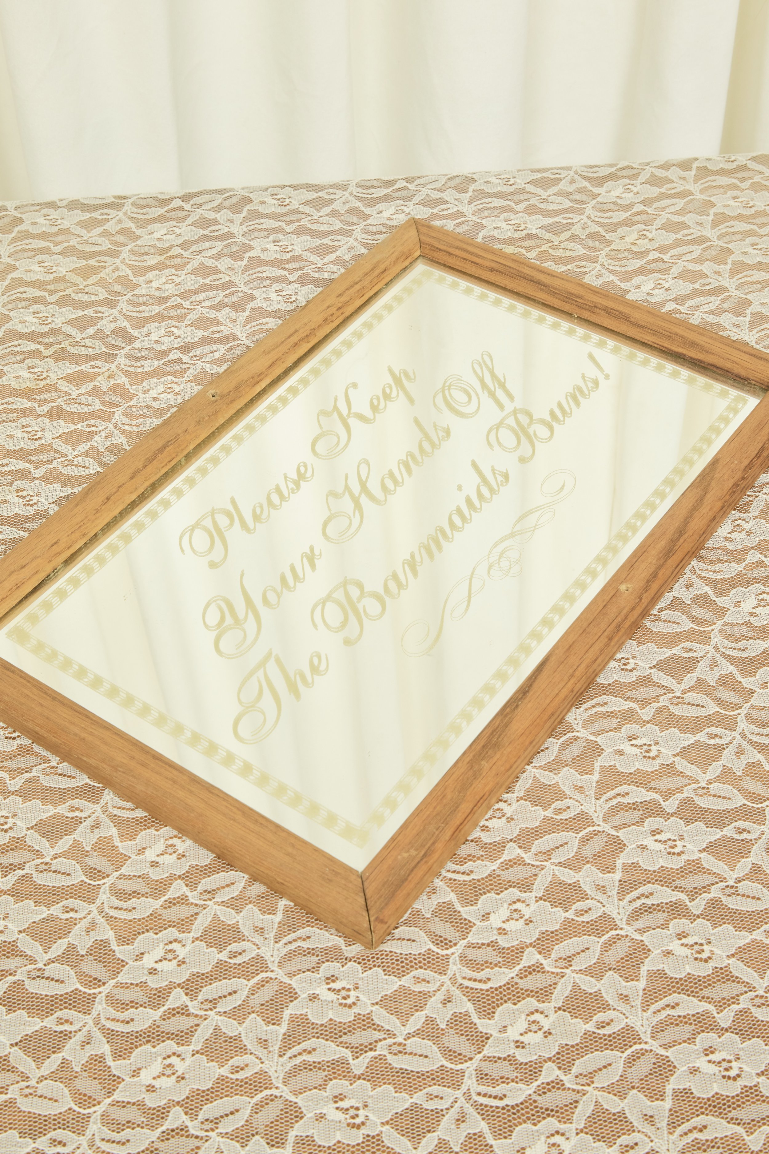 Vintage "Barmaids Buns" Mirror