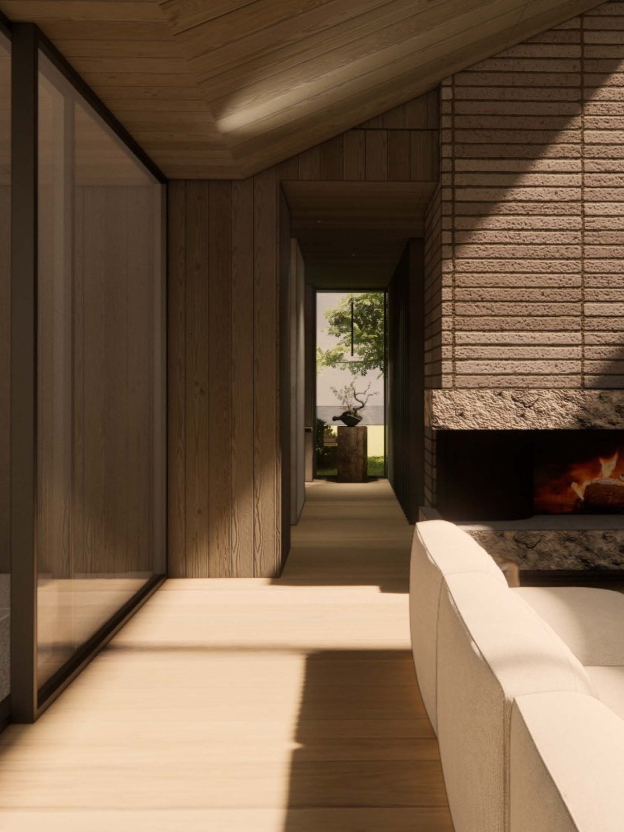 Interior view of a modern living room with wooden walls, a brick fireplace, and a large sliding glass door leading to a hallway with a bonsai tree and greenery outside. Victoria - Qualicum custom home. Architecture and Interior Design.