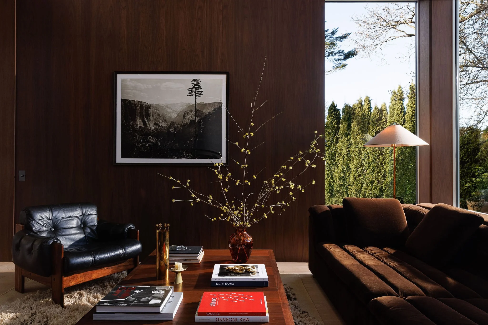 Residential living room featuring walnut wall paneling in Victoria BC by Little Giant