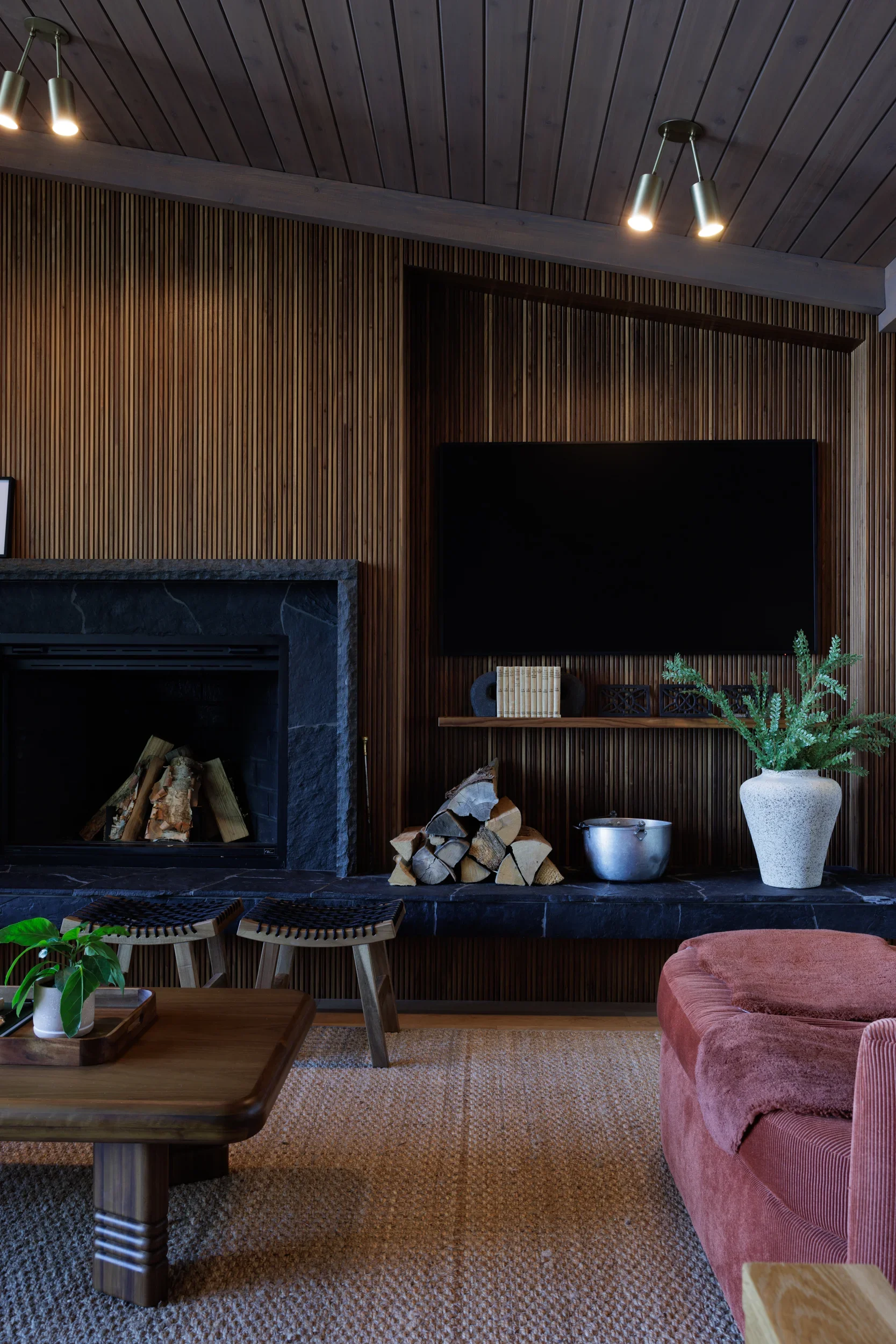 Warm residential interior with natural wood finishes and expansive lake views in Sylvan Lake, Alberta by Little Giant