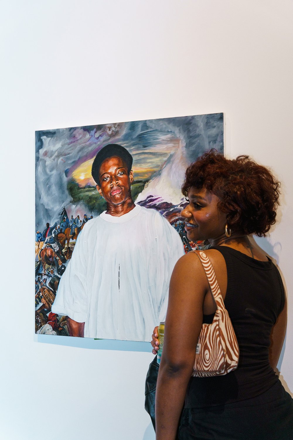  Artist  Nia Simone  alongside her painting “Tryna Find Peace of Mind” featured at the opening reception of  CYCLES  in celebration of Stay Gallery’s 10th Anniversary.  Photo by  Elmer Argueta .   October 22, 2022.  