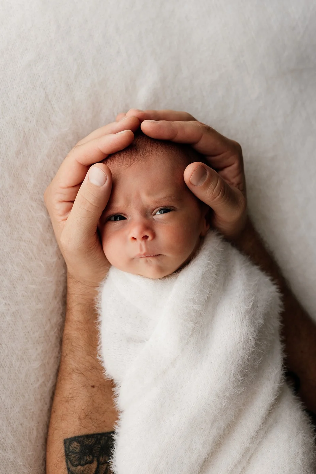 Gold Coast newborn photographer captures new baby at home during Gold Coast baby photo shoot. 