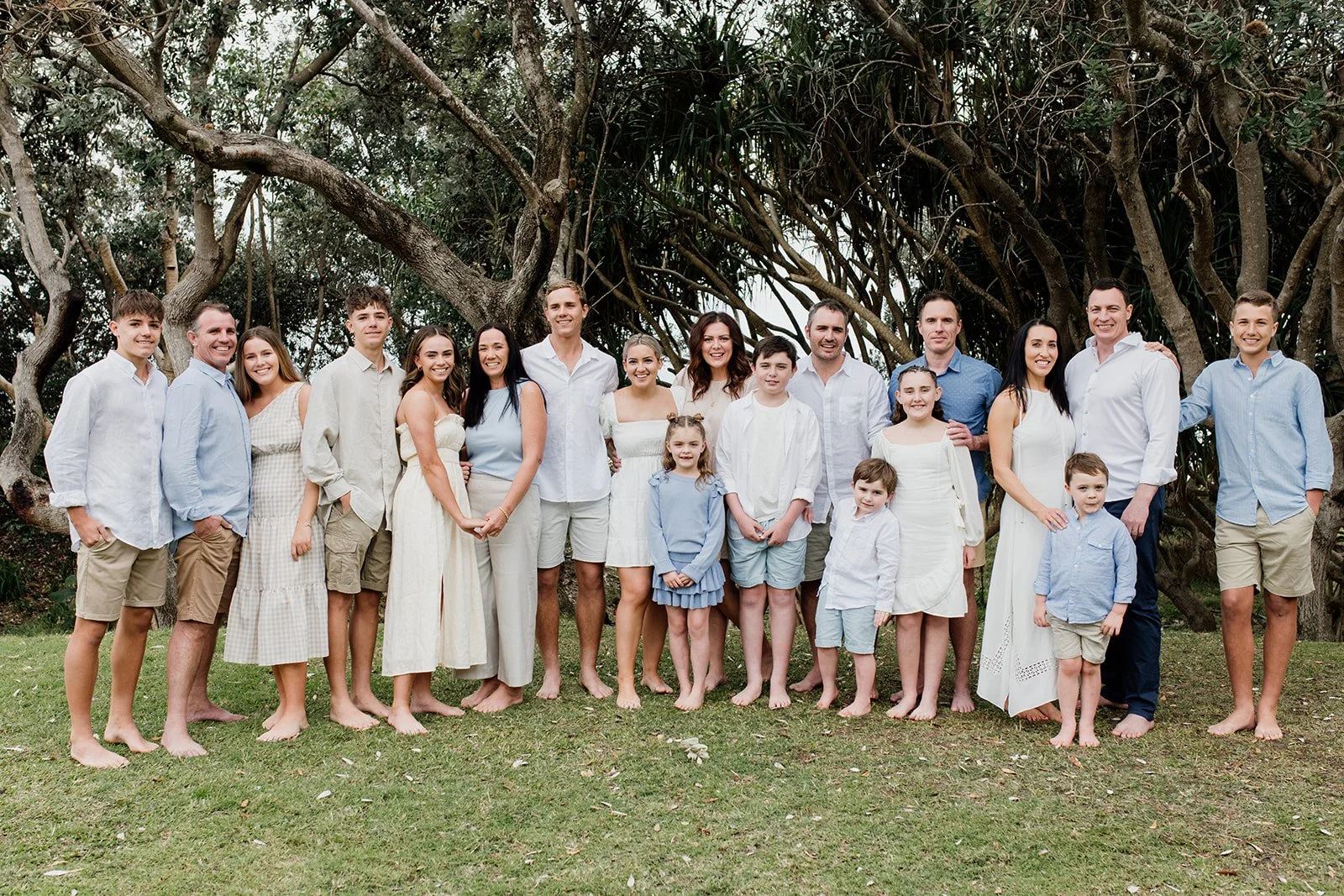 Extended family group at the beach by Gold Coast photographers.