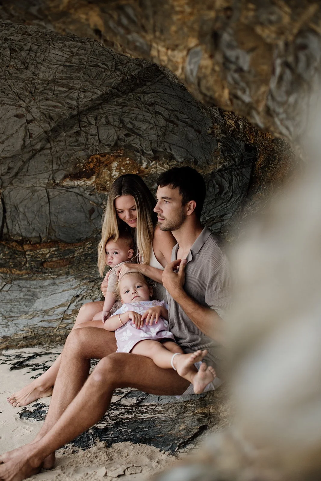 Gold Coast family photographer with parents and children at the beach during Gold Coast family photos. 