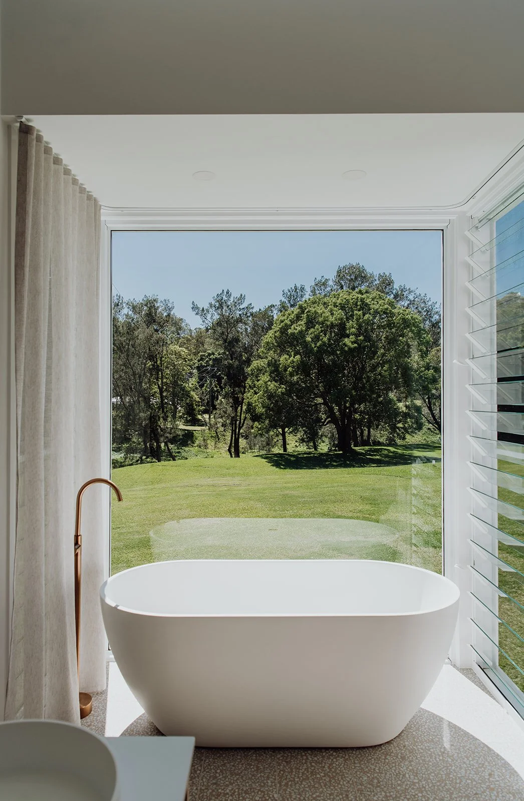 Gold Coast photographer captures view from beautiful bathroom during Gold Coast interiors photography session.