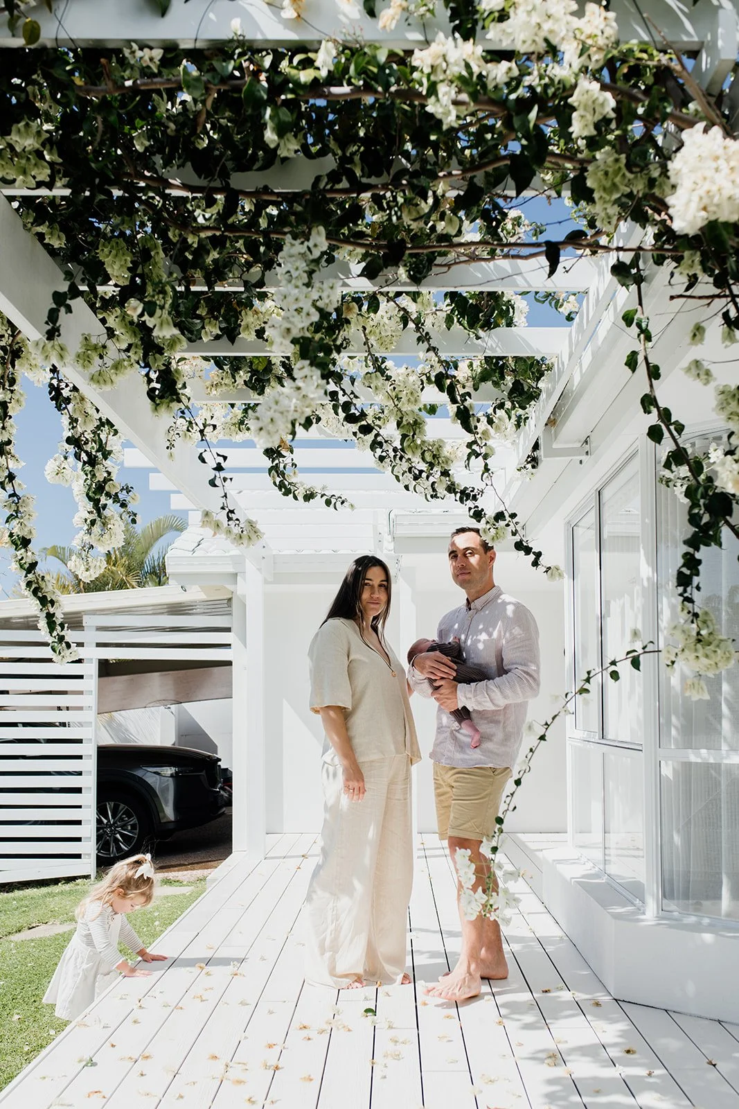 Tweed Coast newborn photo shoot captures young family at home during Tweed Coast baby photo shoot.