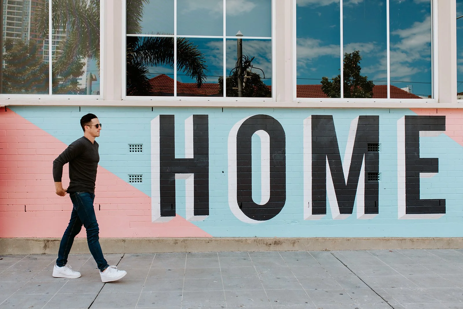 Gold Coast personal branding photographer captures male professional walking in Southport during Gold Coast personal branding photography session.