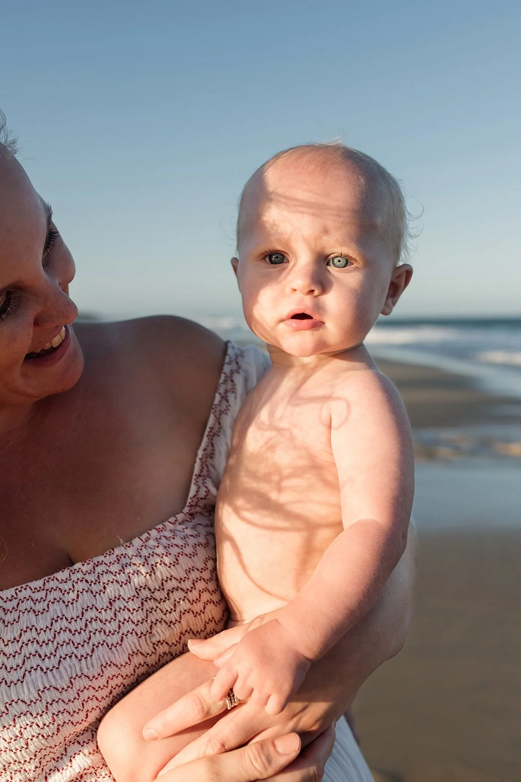 Gold Coast family photographer captures mother and son together at the beach during Gold Coast family photography session