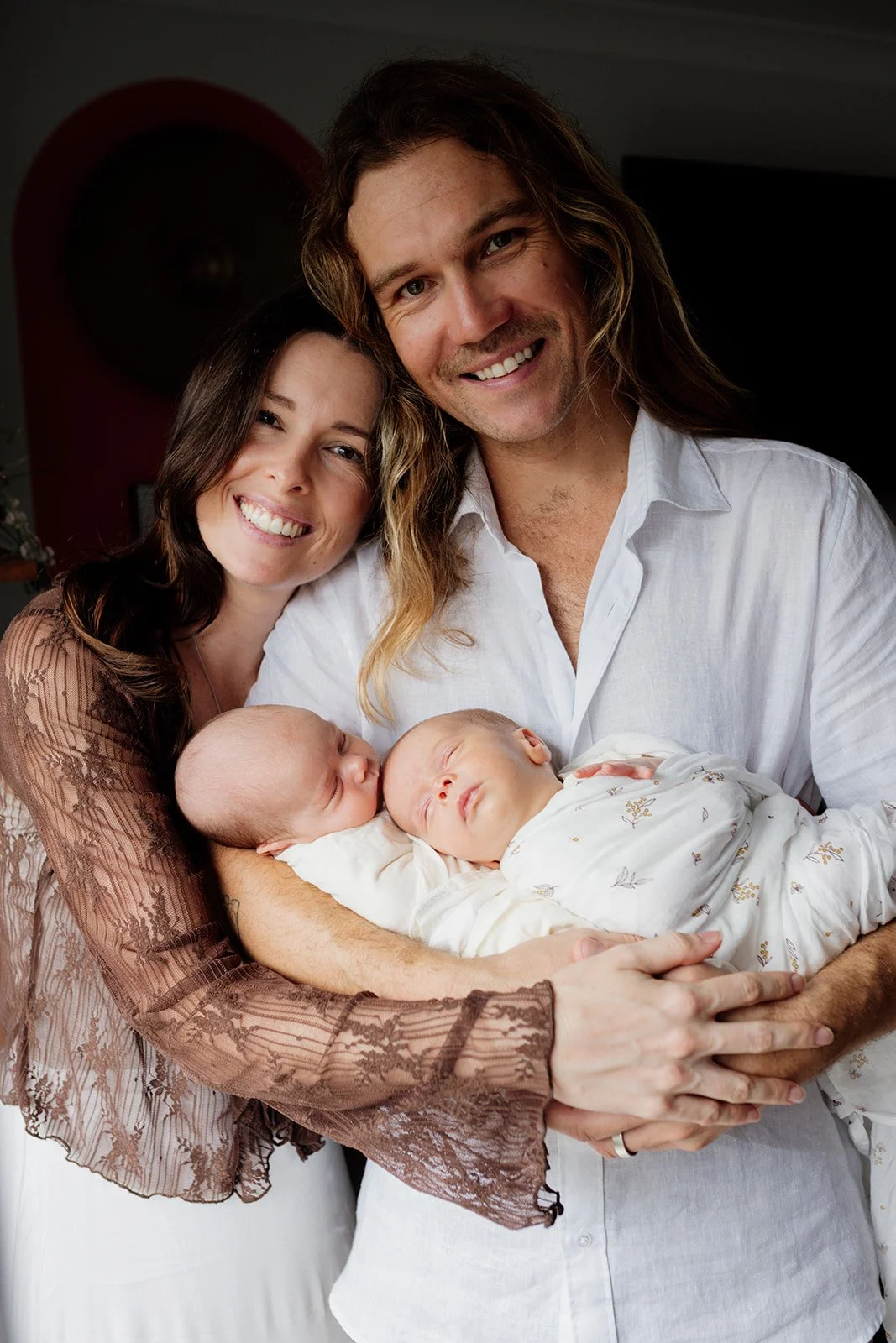 Gold Coast newborn photographer captures babies at home with parents during Gold Coast twins newborn session.