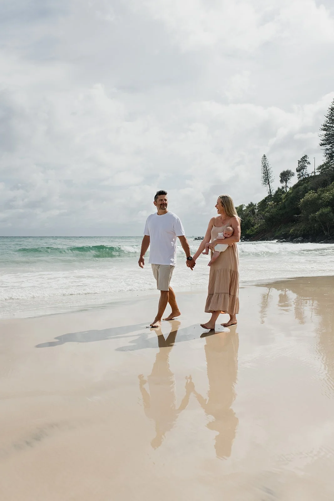 Gold Coast photographer captures family on beach during Gold Coast family photography session.