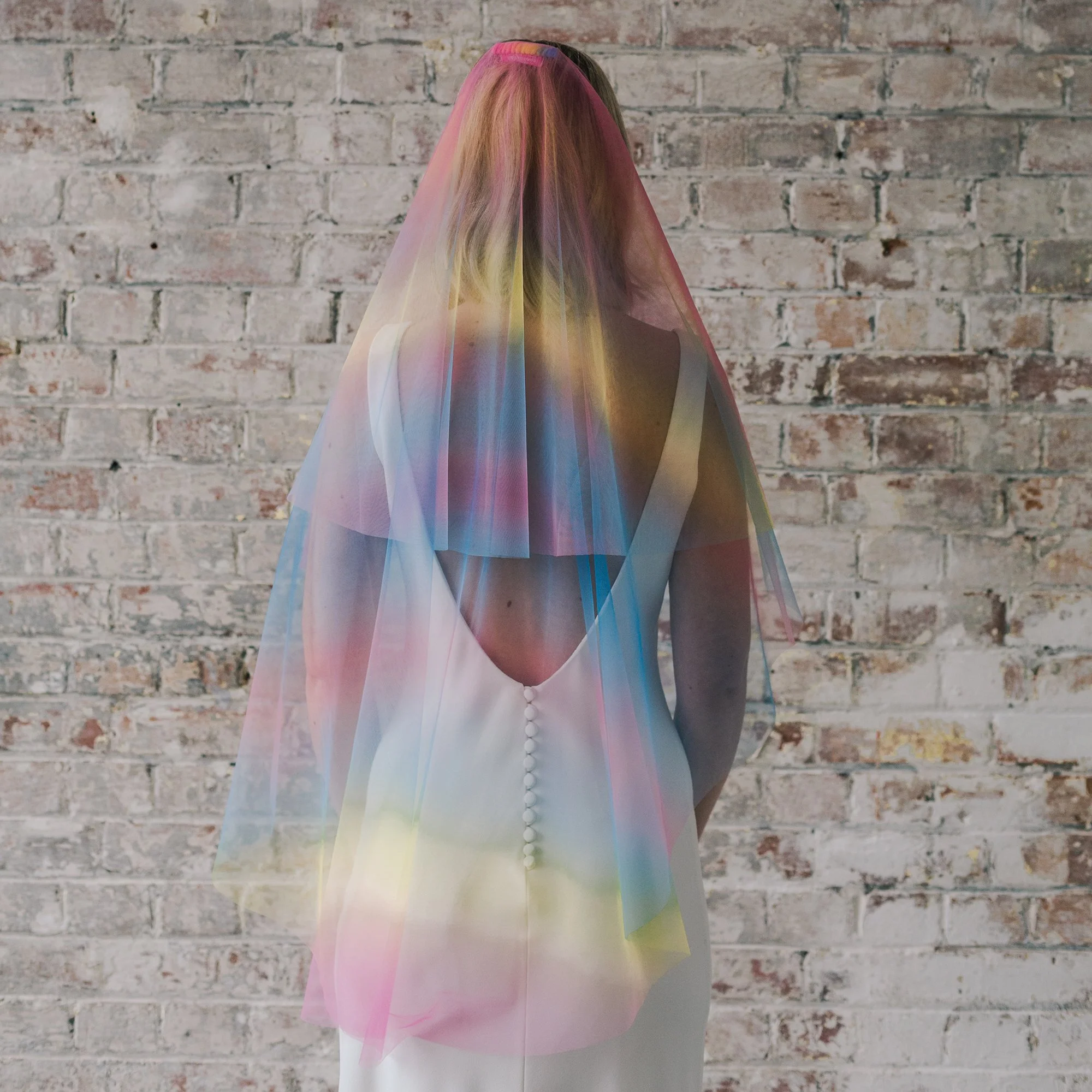 Crown and Glory does some incredible modern twists on veils, including embroidered and appliqued words