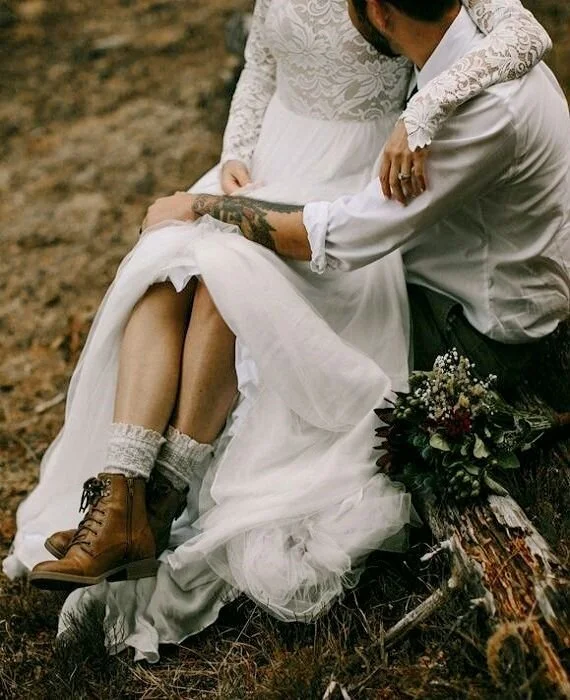 Wedding boots? Yes please. Via Junebug Weddings.