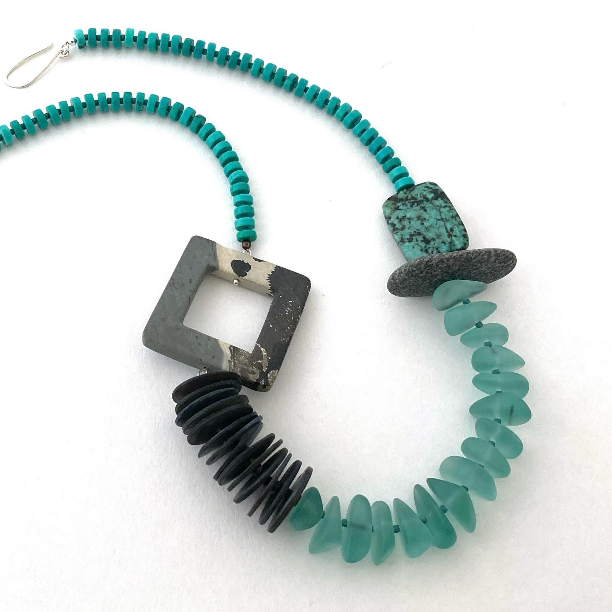 Statement necklace of seaglass, beach stone, african turquoise, hubei province turquoise, jasper, handmade recycled silver hook and ring clasp https://melissajamesjewellery.com/shop-oZIoH/p/green-glass-pebble-necklace-ii #semipreciousjewellery #stone