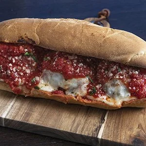 Pizza sandwich on a wooden board