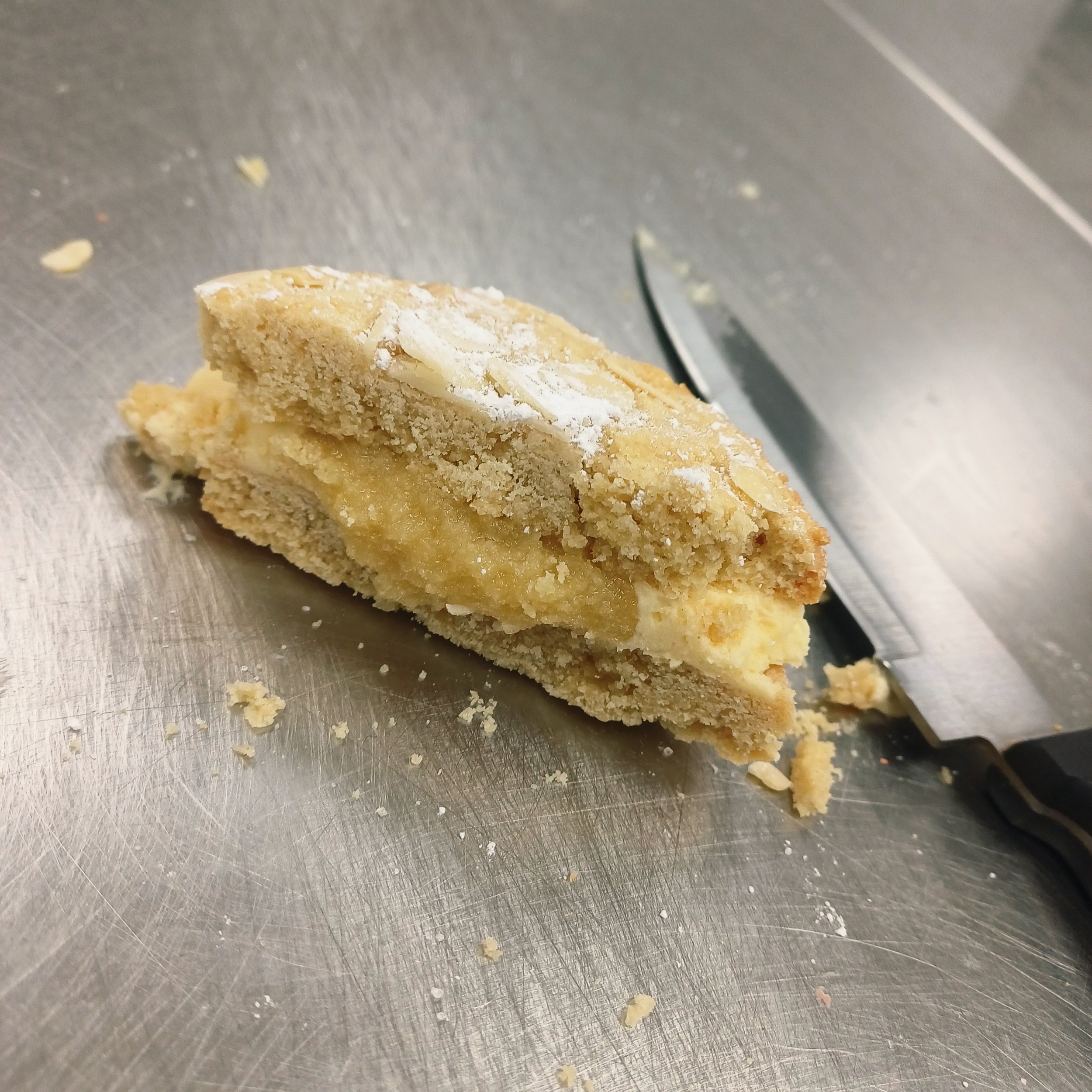 VG Almond Croissant Cookie Sandwich cut in half.jpg