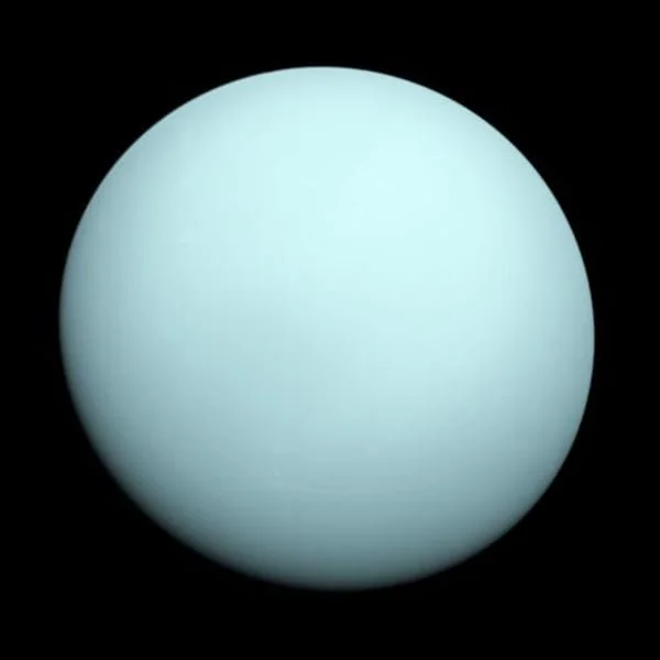 a blue planet on a black background