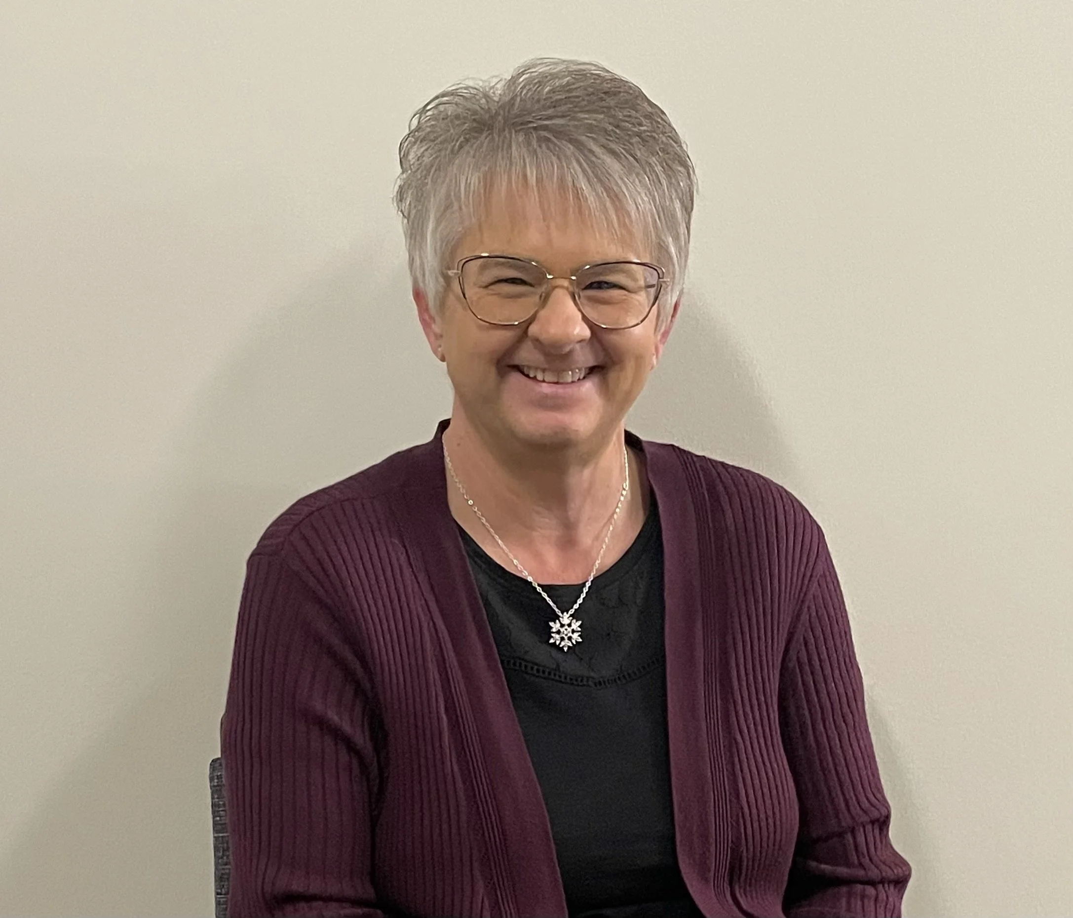 Professional headshot of Program Specialist