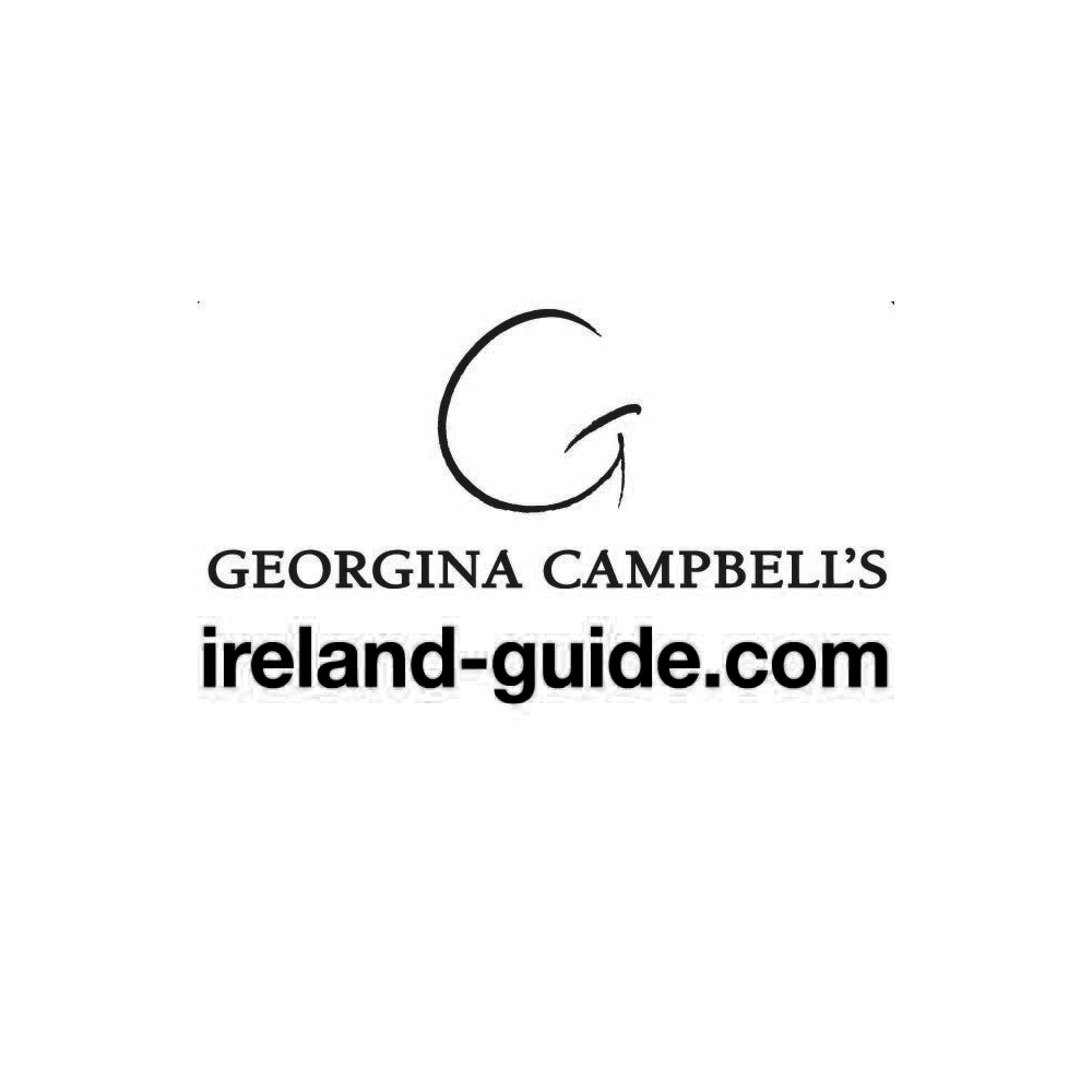Logo for Georgina Campbell's Ireland Guide website featuring a stylized letter 'G' and the URL ireland-guide.com.