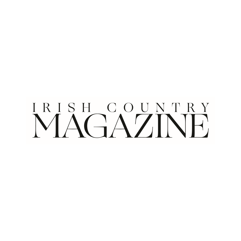 Cover of Irish Country Magazine with black background and white rectangular box containing the magazine title in black uppercase letters.