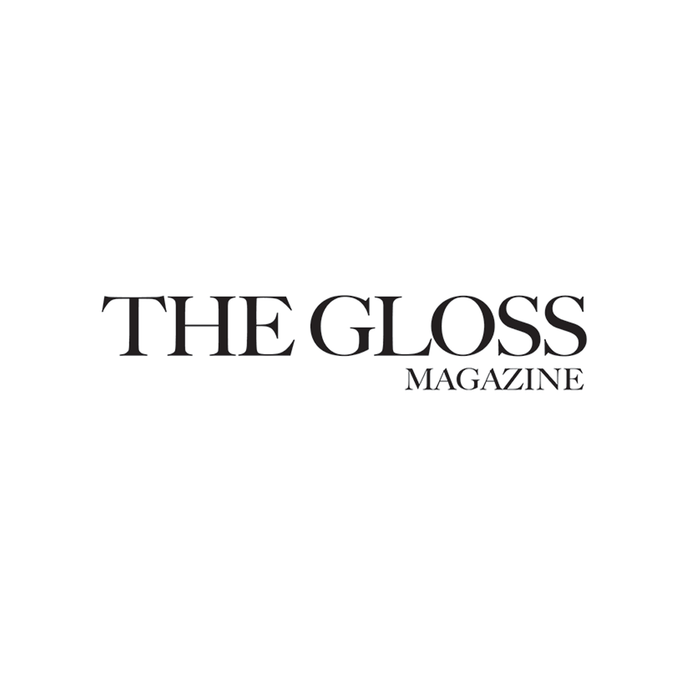 Logo for THE GLOSS MAGAZINE with black and white text