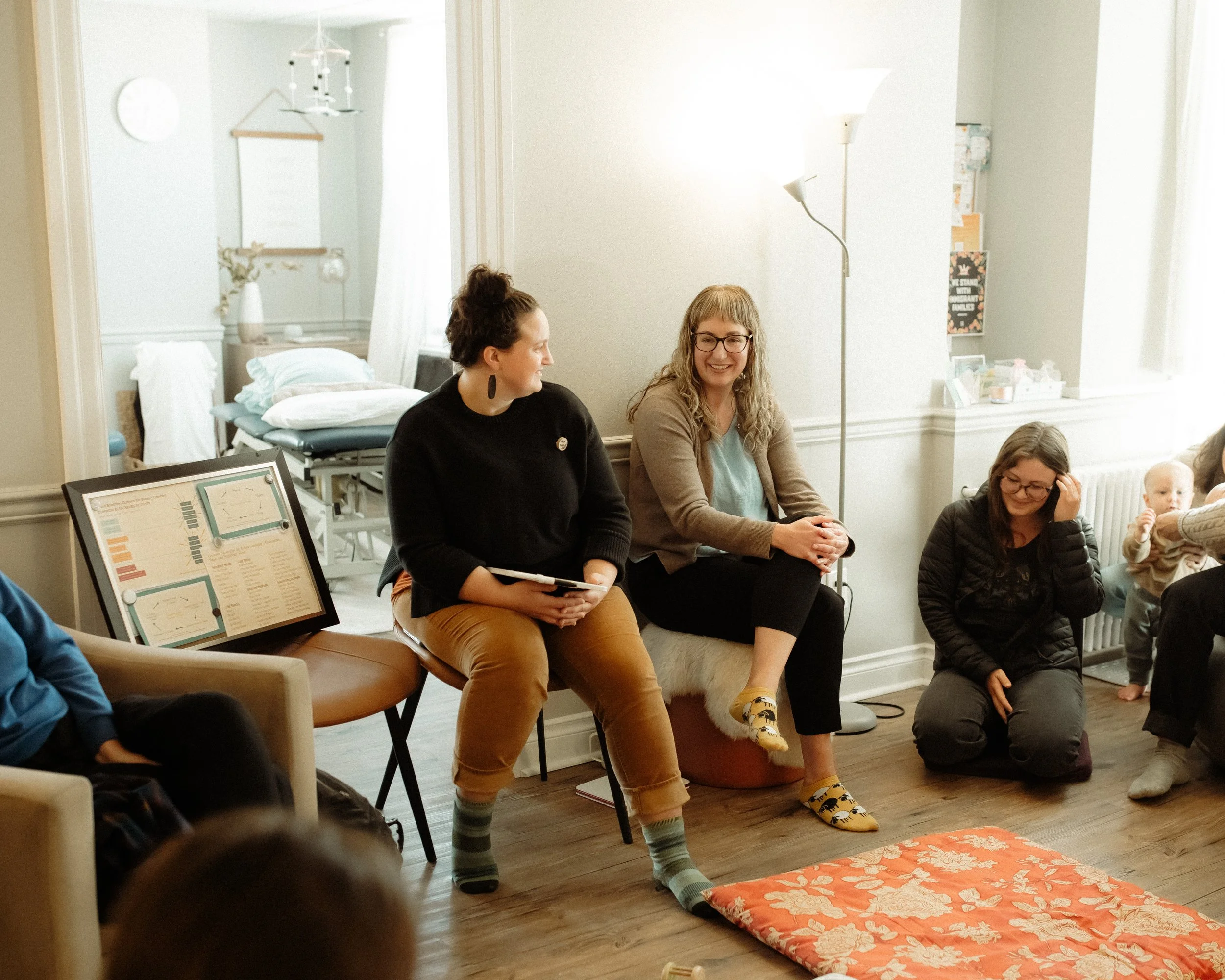Sara Manske of Essential Lactation collaborating with the Onward Love Care Collective to provide holistic postpartum and sleep support in Bellingham.