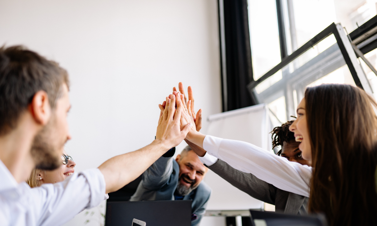 Remote business support team collaborating on projects through virtual communication