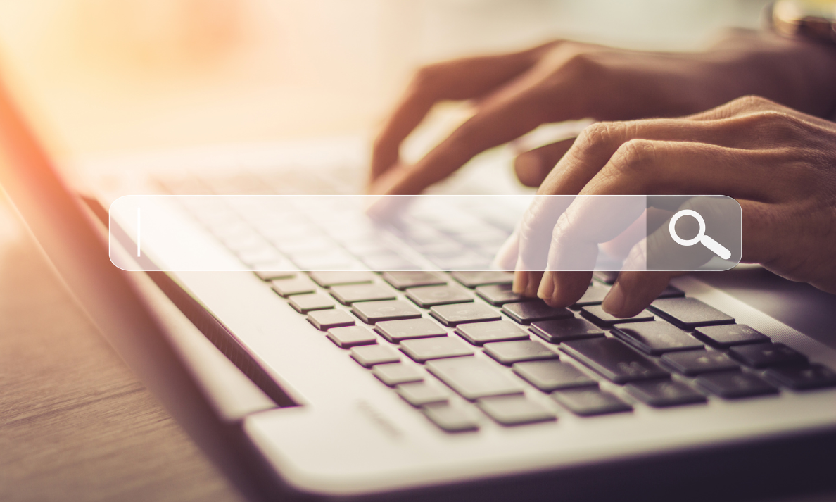 Professional working on a laptop researching the future of SEO and AI powered search