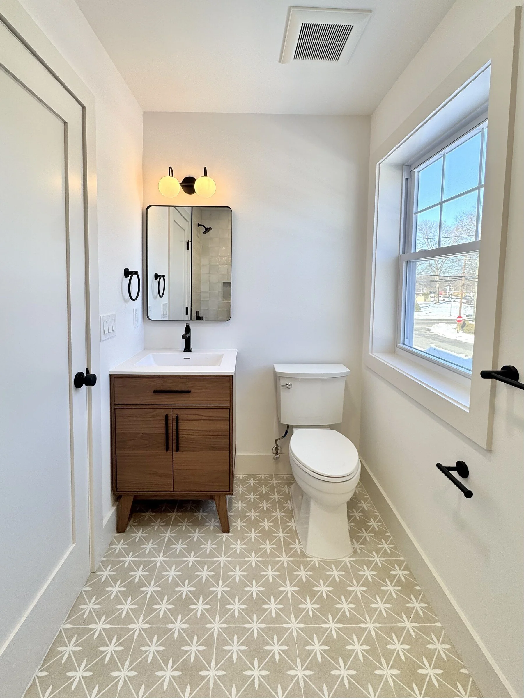 woodland-road-21-guest-bath-walnut-vanity-star-tile-floor.jpg