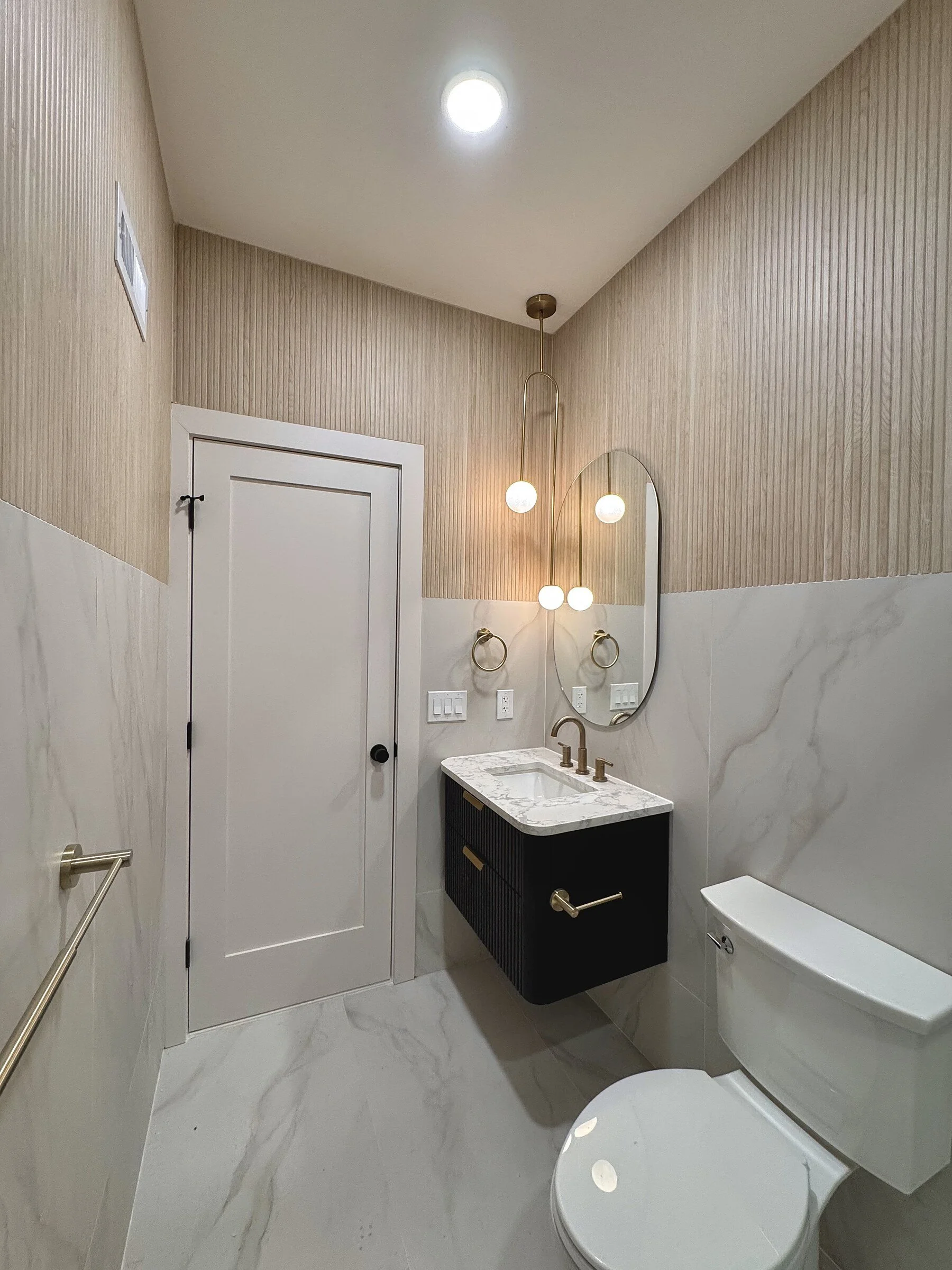 woodland-road-24-powder-room-fluted-walls-marble.jpg