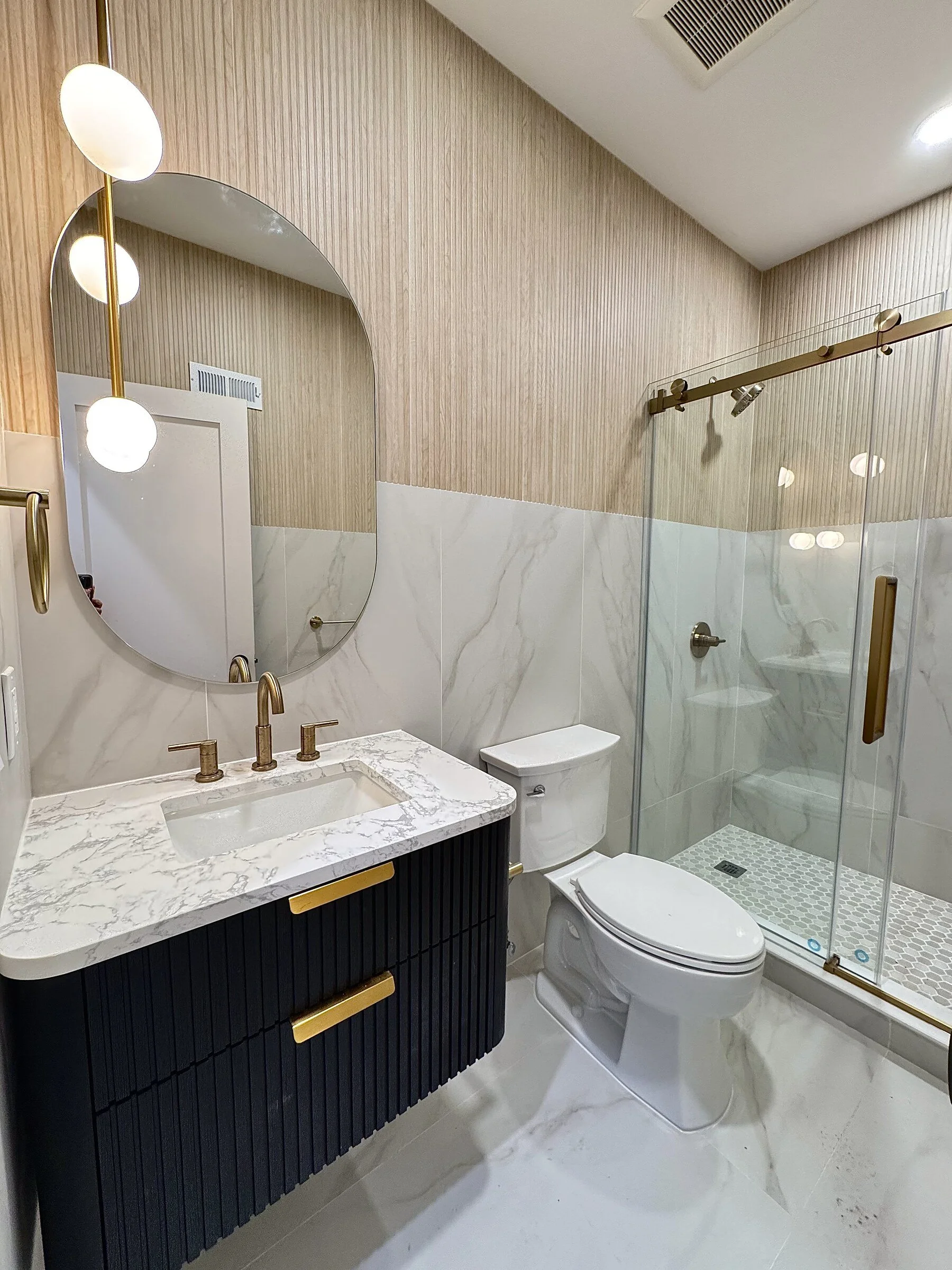 woodland-road-26-powder-room-navy-vanity-wide.jpg
