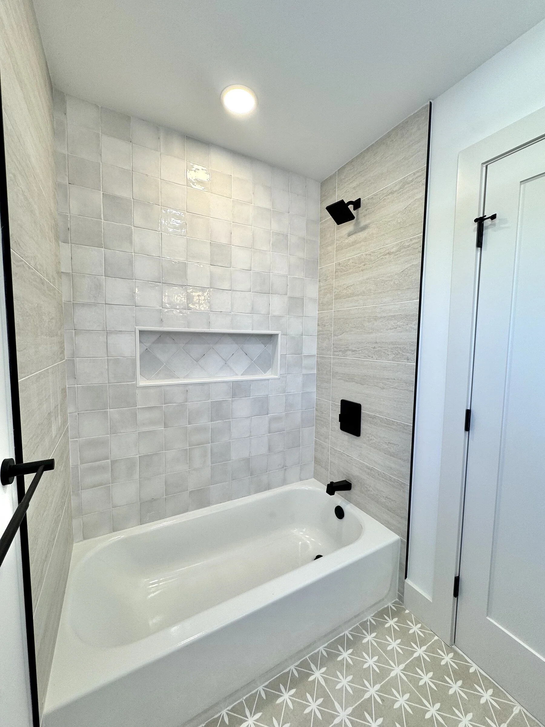 woodland-road-20-second-bath-tub-shower-marble-tile.jpg