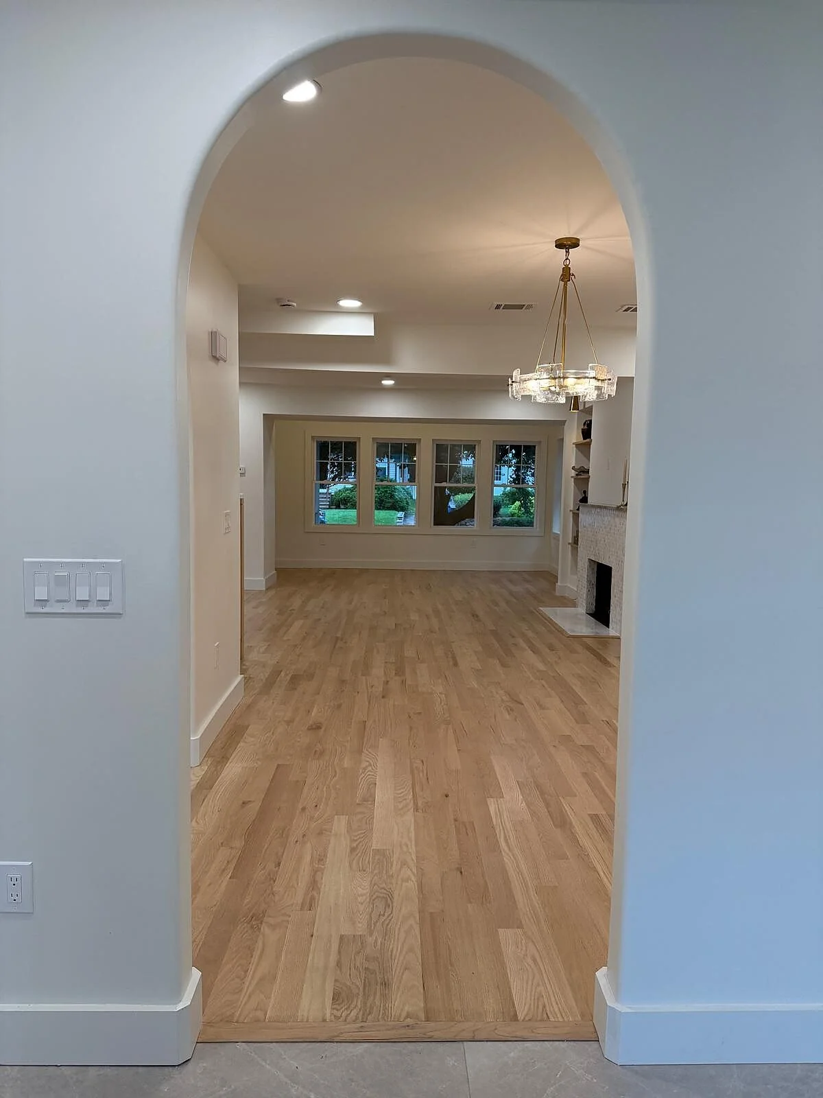 queens-court-06-arched-opening-red-oak-hardwood.jpg