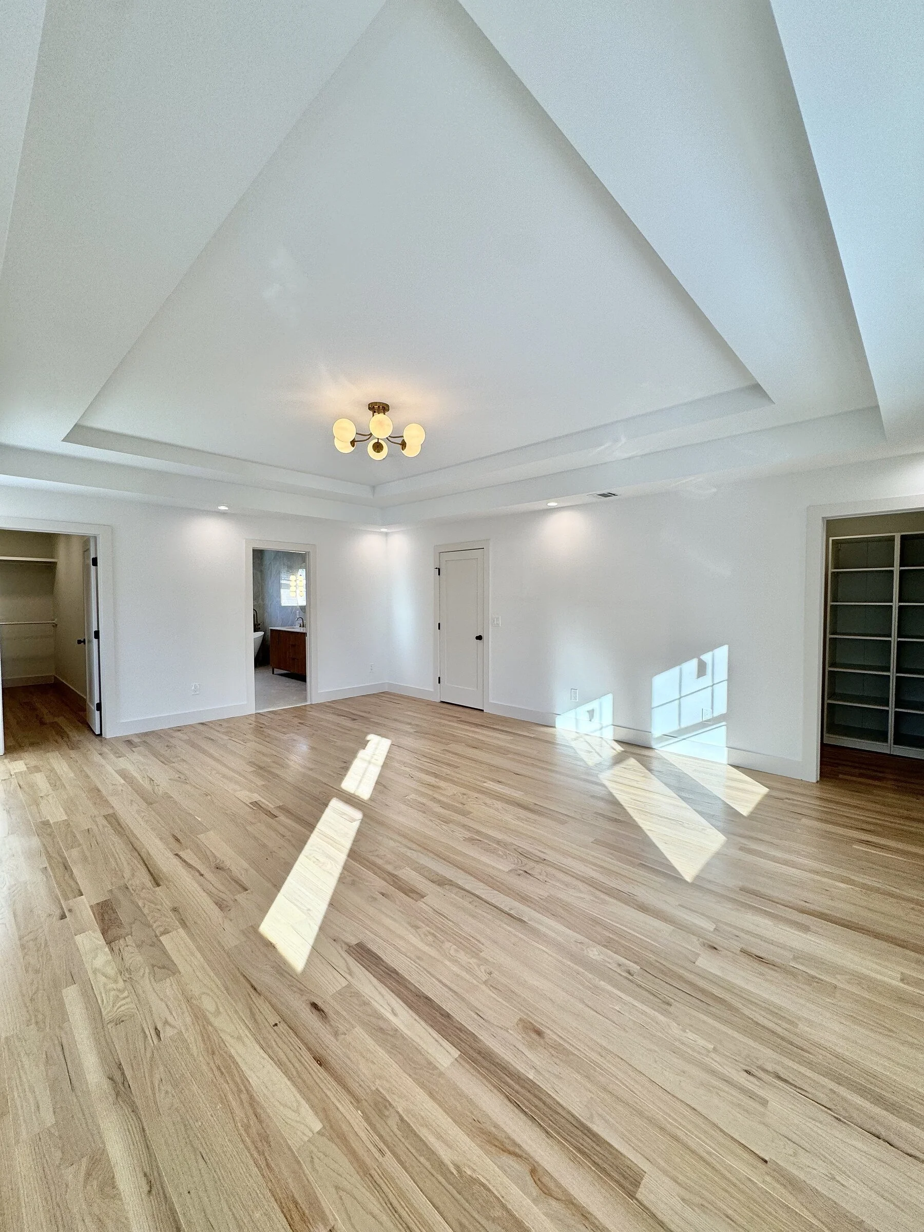 woodland-road-08-primary-bedroom-wide-view.jpg
