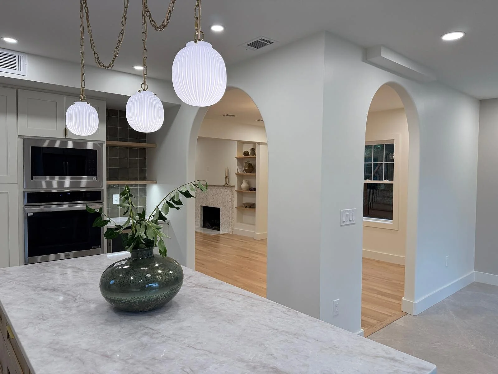 queens-court-04-kitchen-island-view-to-living-room.jpg