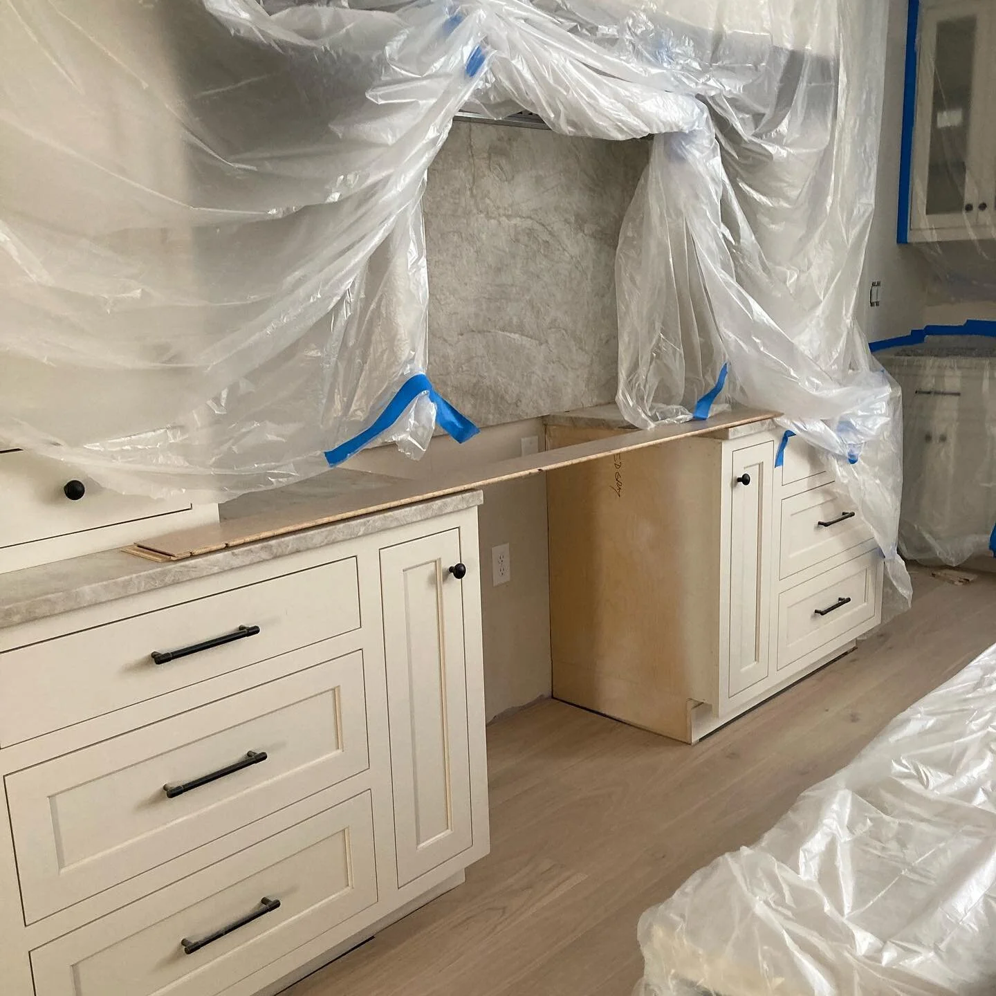 Flooring install started today! The wood sliding into that saw cut stone is so gratifying. 

#leawoodcharmer #inchingtowardsthefinishline #homereno #kc #leawood