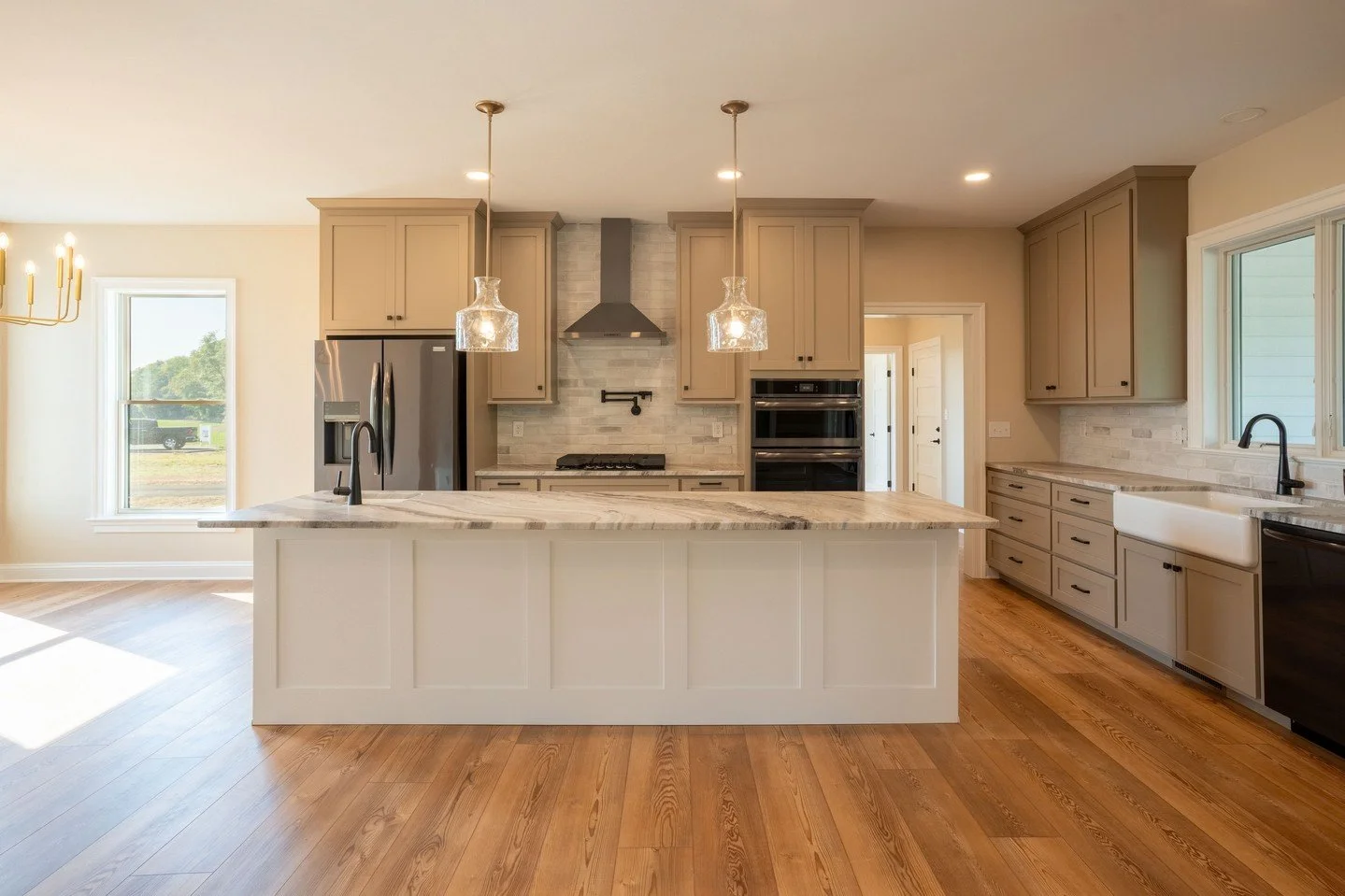 A custom kitchen isn't just about how it looks.�It's about how it works.⁠
⁠
The cabinetry. The countertops. The built-in trash drawer. The pull-out dog bowl station. Every detail has a purpose because every family lives differently.⁠
⁠
Where Custom M