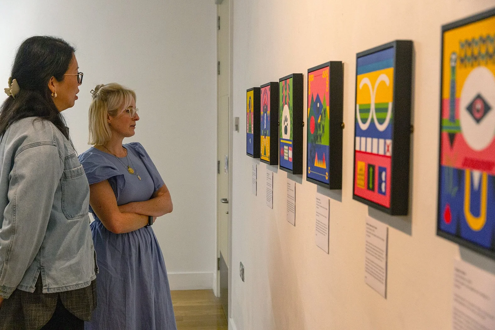 Sophia and Lucy looking at artworks.jpg
