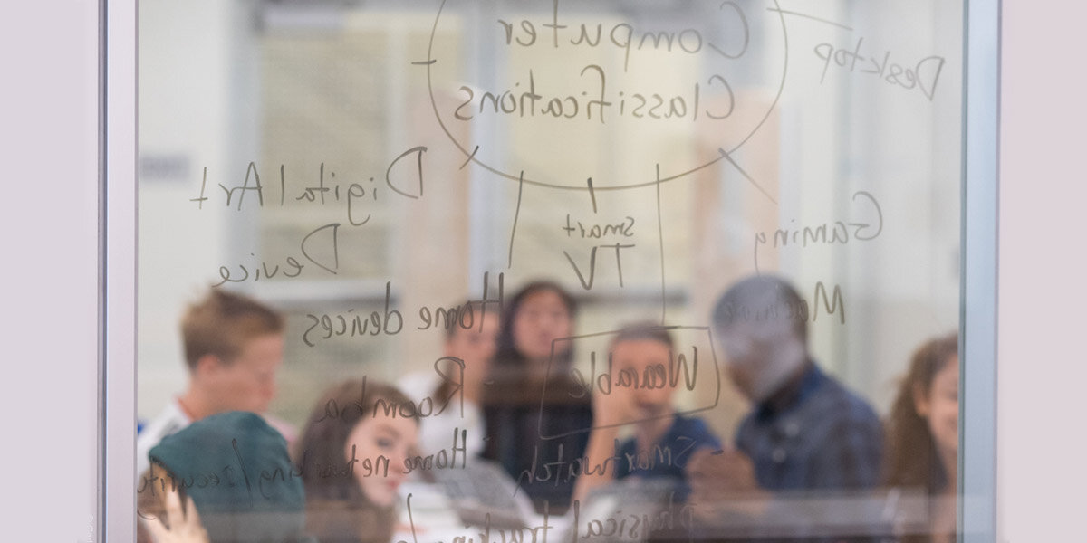 Students looking at a diagram