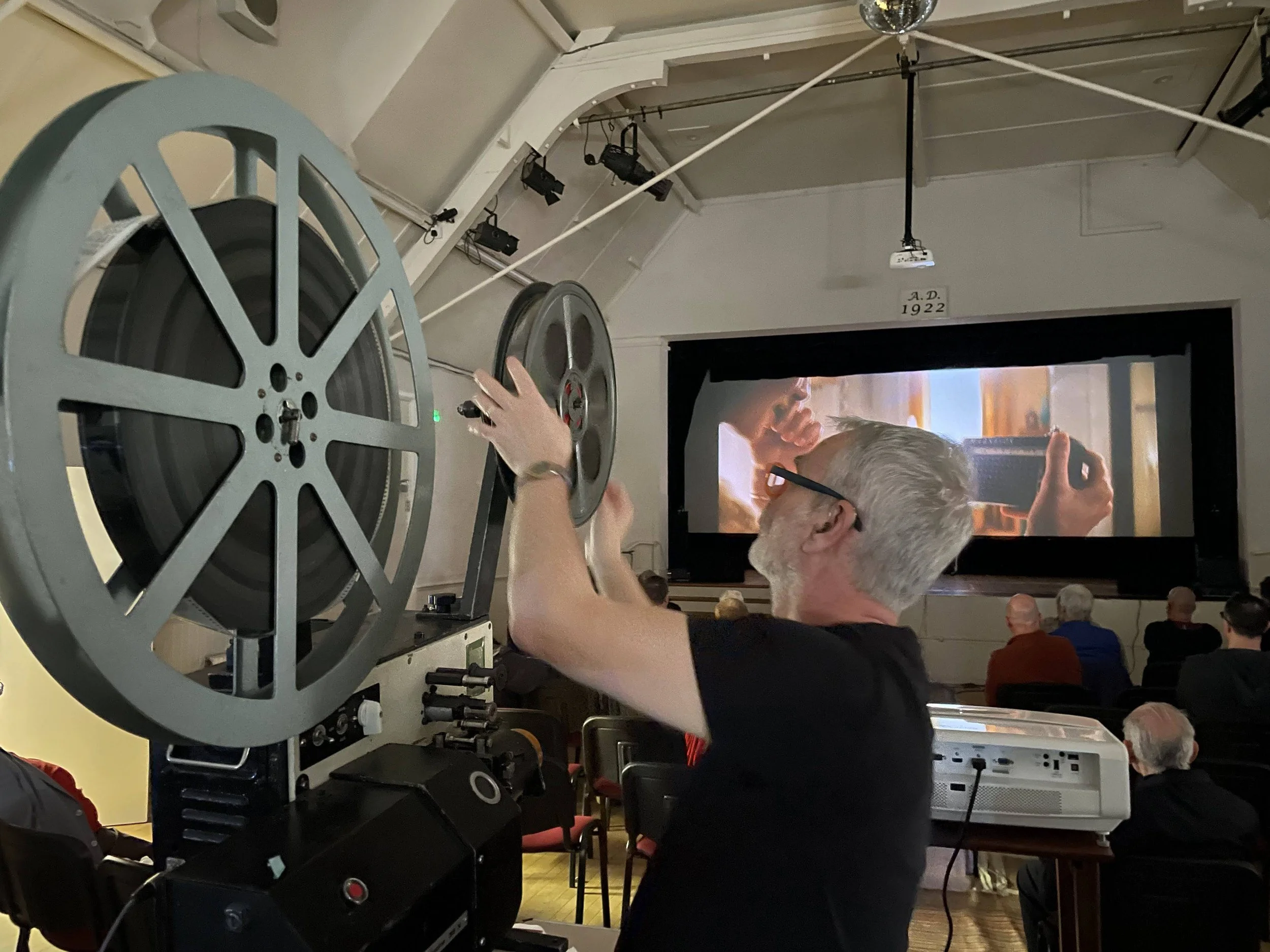 Simon projecting 35mm at British Film Collectors Convention 2023