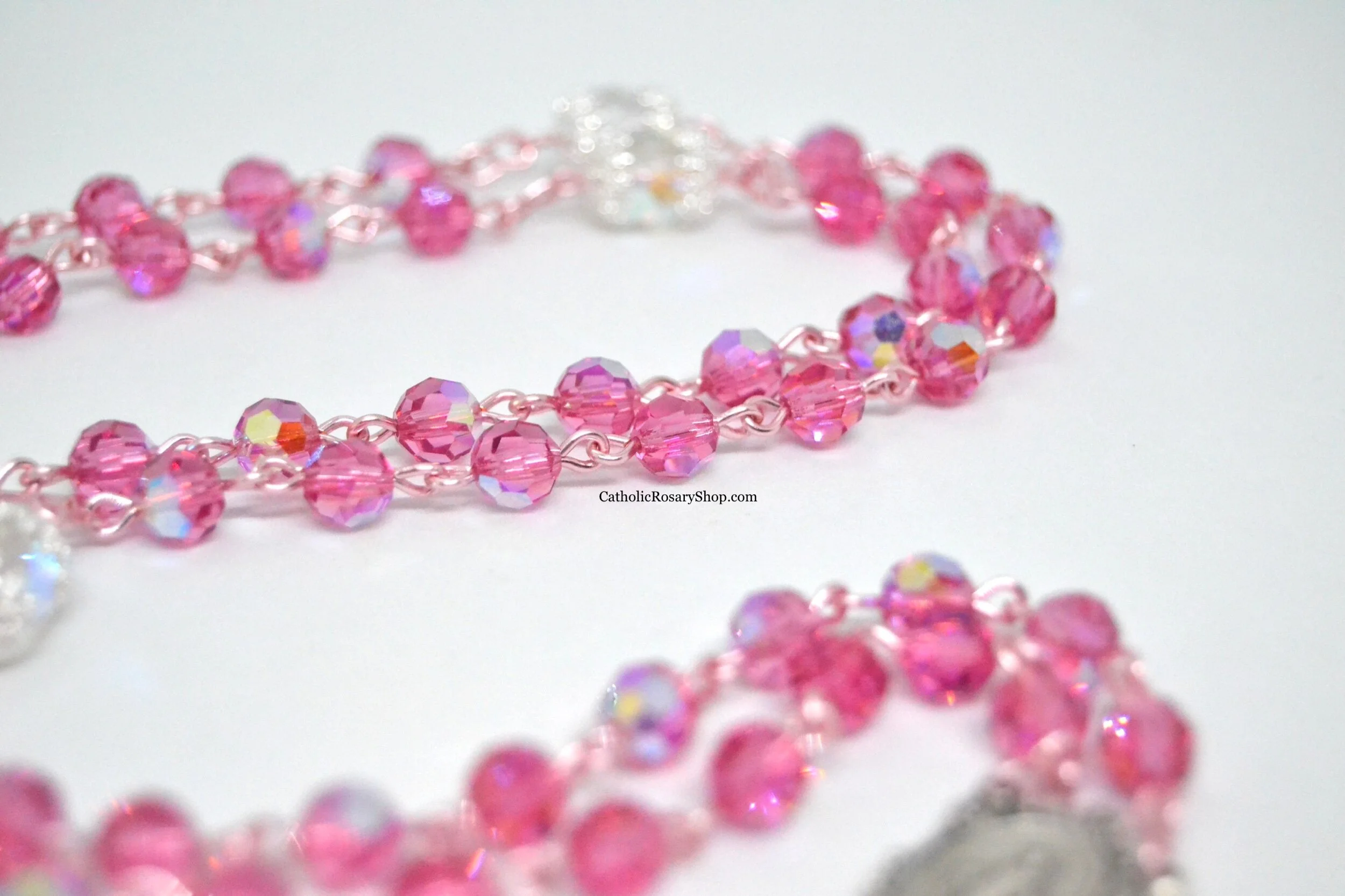 Bright Pink and Clear Czech Glass Rosary on Rose Gold Wire | CatholicRosaryShop.com