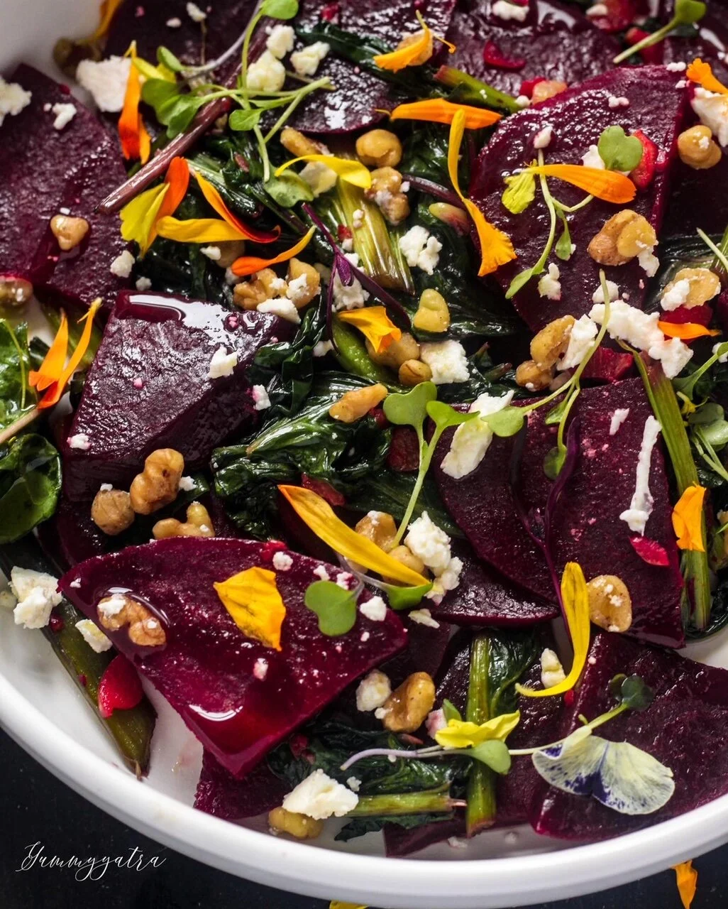 Beet salad with greens and walnuts